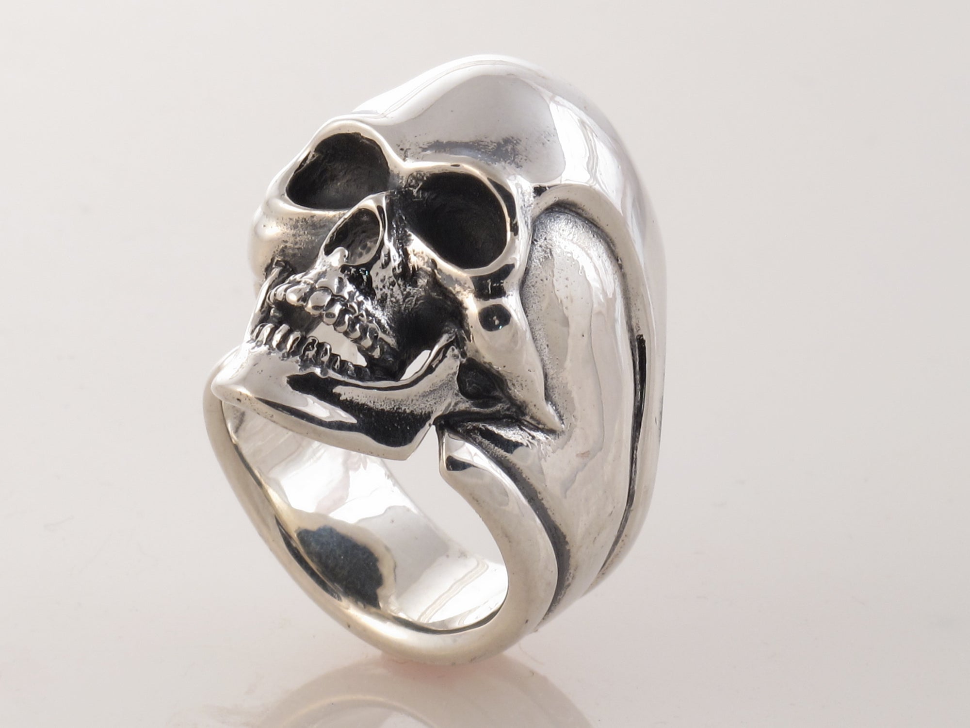 "#DR - 12 Sterling Skull Ring as seen from the side."