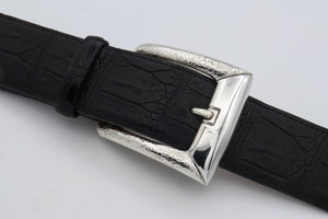 image of #1393 polished and hammer textured sterling harness buckle.on a black belt strap.