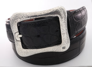 Gently curved free form garrison ,or centre bar buckle, with a vintage, distressed hammered surface. Shown on black belt.