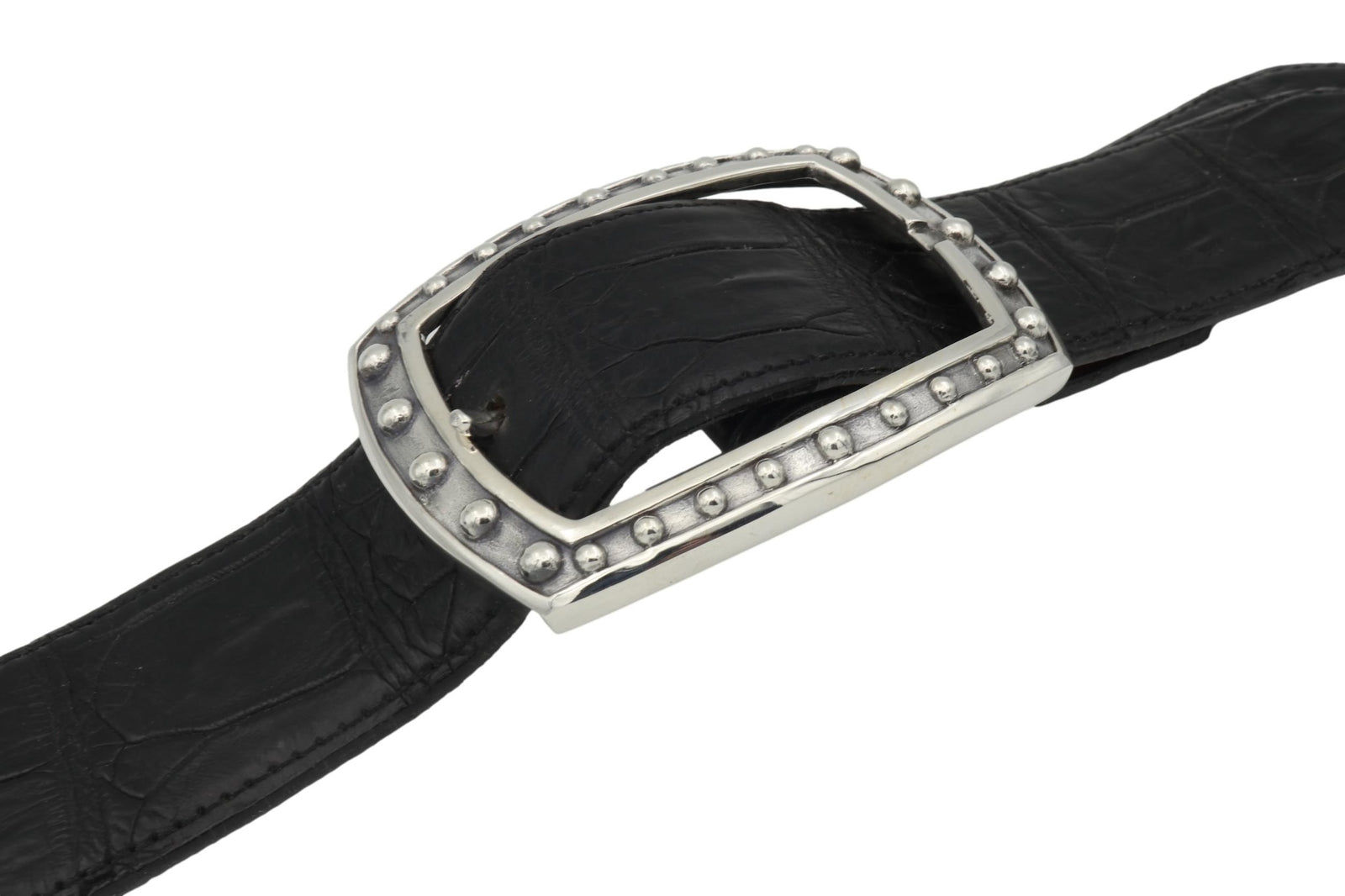Sterling Buckle of a bowed out rectangular shape, narrow frame with beaded edging on black belt. fits 1.5" belt.