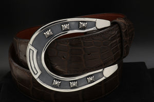 Bold Sterling Horseshoe buckle with nailheads. Shown on a dark brown alligator coiled belt.