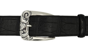 Classic Sterling harness style buckle with deep carved scroll design on front. Top view.