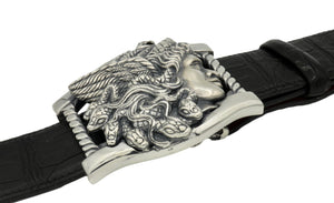 Side view, Sterling buckle Medusa head, carved as a side view. It sits on a base frame accented with twist detail.