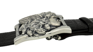 Side view, Sterling buckle Medusa head, carved as a side view. It sits on a base frame accented with twist detail.