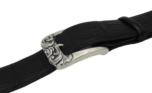 Side view, Classic Sterling harness style buckle with deep carved scroll design on front. Top view.