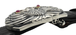 The Phoenix sterling buckle, side view, accented with 18kt gold bezel set ruby cabs and a dark yellow spessaratine eye.