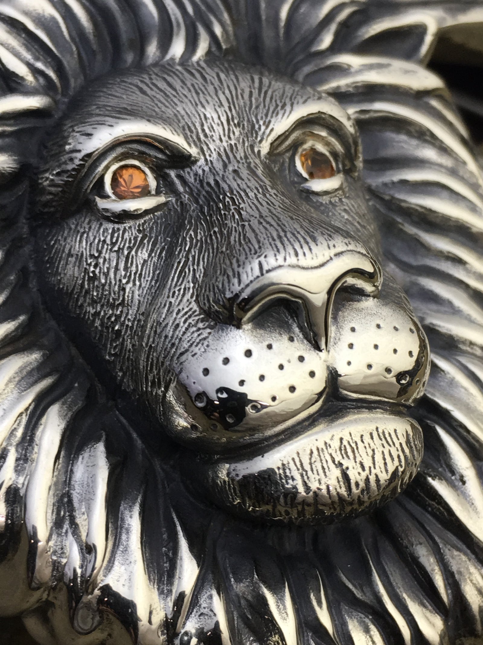 #1250S -  Sterling Lion's Head Buckle with Spessaratite Eyes