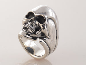 "#DR - 12 Sterling Skull ring as seen from the front angle view."