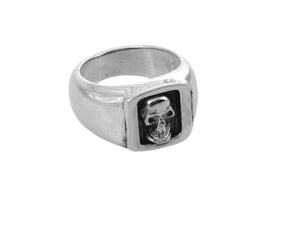 #DR - 16 Sterling Small Boxed Skull Ring seen from front."