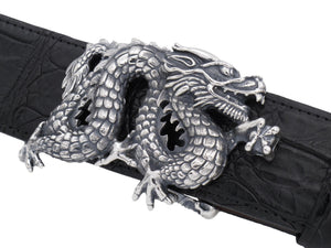 Angled view of the sterling Freestanding Dragon buckle on a black Alligator belt.