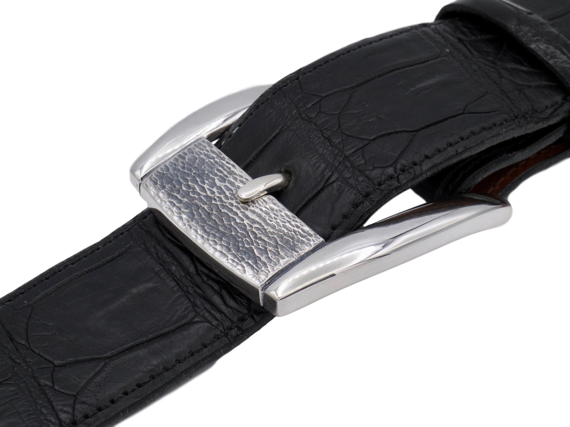 Front view of the Textured Front Dress Buckle in Sterling for 1.5" straps. Pictured on a black alligator strap.